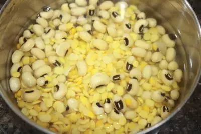 Soaked black-eyed peas and tuvar dal.