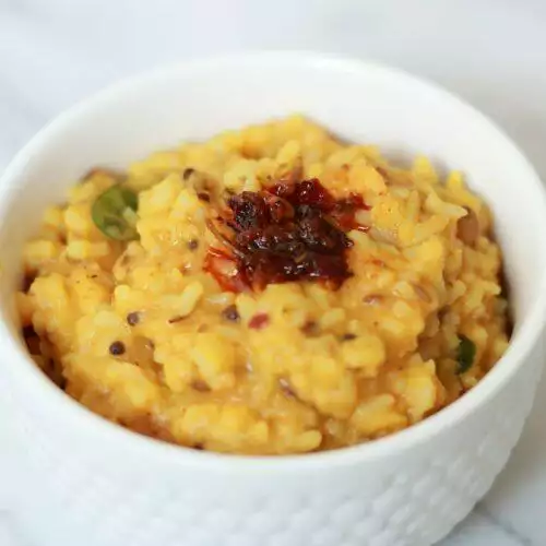 The Andhra Ghee Mudda Pappu Gongura Rice is a mildly spicy gooey one-dish meal.