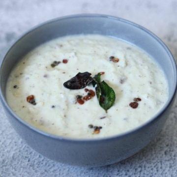 The Andhra Kobbari Perugu Pachadi, also called Thengai Thayir Pachadi in Tamil Nadu, is a Coconut and Dahi Chutney