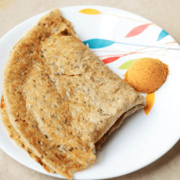 Oats Dosa is a crisp crepe made in India. The batter is made by grinding soaked rolled oats, green chillies, ginger, curry leaves and salt.